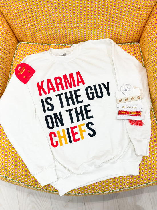 Karma is the guy on the team sweatshirt