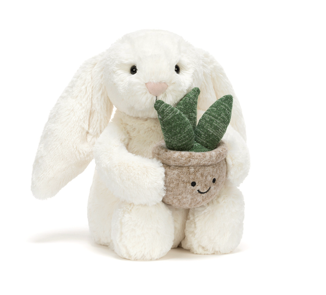 cream bunny with plant